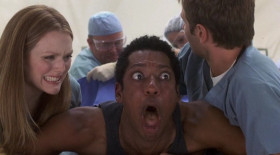 - For the love of everything good and holy, get this goddamn thing out of me!
- You're gonna be okay. Cut him open. Let's get this thing.
- Cut me open? There goes your Christmas gift, Judas!
- It's moving down his leg.
- What do we do?
- Maybe amputate.
- Whoa, don't take the leg! Don't let 'em take my leg.
- Is there anything else you can do? He thinks he's an athlete.
- Doctor, look.
- It's heading for his testicles.
- Take it! Take the leg!
- Wait, wait! It's going the otherway.
- Give me some forceps. I might be able to catch it in his colon.
- How're you going in?
- Rectally.
- I'll get the lubricant.
- No time for lubricant.
- There's always time for lubricant!
- Flip him!
- Try to relax.
- Everything's gonna be okay.
- I'll shove this gurney up your ass! See if you relax, Ira.
<...>
- It's over, it's over.
- Don'tyou ever do that again!
- The size ofthat thing insideyou! It was like this! You took it like a man.