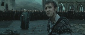 - It doesn’t matter that Harry is gone.
- Stand down, Neville!
- People die every day. Friends. Family. Yes, we lost Harry tonight. But he’s still with us, here...  And so is Fred and Remus and Tonks and... all of them. They didn’t die in vain. But you will. And you and you and you will. And so will you. Because you’re wrong. Harry’s heart did beat for us. All of us...