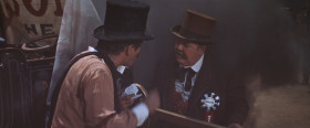 <b>Mayor of Boracho:</b> - You're the guest of honor.
<b>Professor Fate:</b> - Well, I don't want to be a guest of honor.
<...>
<b>Mayor of Boracho:</b> - You're gonna attend the meeting tonight... or, by jumped-up Harry, you're gonna be guest of honor at a necktie party!
<b>Maximilian Meen:</b> - Necktie? Well, what kind of cheap present is that?
