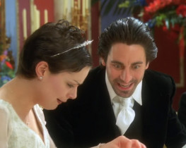 - That's my engagement ring. Oh, and, a singing ring never fails to get his girl. It's destiny. Put it on, put it on.
- Well, all right, I'll just try it on. But I'm not getting married.
- Of course you are, a baby's got to have a father.
- I don't intend to have any children, thank you very much.
- Well, it's a little bit late for that.