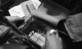 Survival kit contents check. In them, you will find one 45-caliber automatic... two boxes of ammunition... four days' concentrated emergency rations... one drug issue containing antibiotics... morphine, vitamin pills, pep pills... sleeping pills, tranquilizer pills... One miniature combination Russian phrase book and Bible... $100 in rubles... $100 in gold... nine packs of chewing gum... one issue of prophylactics... three lipsticks, three pair of nylon stockings. Shoot, a fella could have a pretty good weekend in Vegas with that stuff.