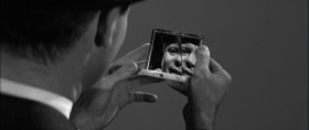 - The mirror... It's broken.
- Yes, I know. I like it that way. Makes me look the way I feel.
