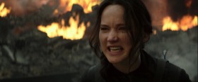 I want the rebels to know that I'm alive. That I'm in District 8 where the Capitol just bombed a hospital filled with unarmed men, women and children. And there will be no survivors. If you think for one second that the Capitol will ever treat us fairly you are lying to yourselves. Because we know who they are and what they do. This is what they do! And we must fight back. I have a message for President Snow. You can torture us and bomb us and burn our districts to the ground. But do you see that? Fire is catching. And if we burn, you burn with us!

