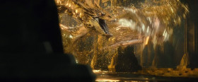 <b>Smaug:</b> - Revenge? Revenge? I will show you revenge! [takes flight towards Lake Town] I am fire! I am... death!