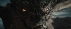 <b>Smaug:</b> - Revenge? Revenge? I will show you revenge! [takes flight towards Lake Town] I am fire! I am... death!