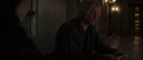 Katniss, maybe the country was shocked tonight by your arrow, but once again, I was not. You were exactly who I believed you were. I wish I could give you a proper goodbye. But with both Coin and Snow dead, the fate of the country will be decided tonight, and I can't be seen at your side. Tonight, the 12 District leaders will call for a free election. There's little doubt that Paylor will carry it. She's become the voice of reason. I'm sorry so much burden fell on you. I know you'll never escape it. But if I had to put you through it again for this outcome, I would. The war's over. We'll enter that sweet period where everyone agrees not to repeat the recent horrors. Of course, we're fickle, stupid beings, with poor memories and a great gift for self.destruction. Although, who knows? Maybe this time, we'll learn. I've secured you a ride out of The Capitol. It's better for you to be out of sight. And when the time is right, Commander Paylor will pardon you. The country will find its peace. I hope you can find yours.
Plutarch.
