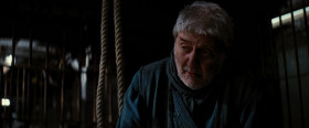 The legend is that there was a mercenary who worked for a local warlord. He fell in love with the warlord's daughter. They were married in secret. When the warlord found out... the mercenary was condemned to this pit. But then he exiled him instead. The mercenary understood that it was the daughter who had secured his release. But what he could not know was the true price of his freedom. She took his place in the pit. And she was with child... the mercenary's child. Innocence cannot flower underground. It has to be stamped out. One day, the doctor forgot
to lock the cell. But the child had a friend... a protector who showed the others that this innocence was their redemption. It was to be prized. The mother was not so lucky.