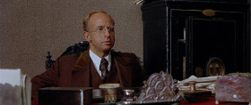 - I'm looking for a first-class bank.
- Oh, but exactly.
- Yeah. The largest and most secure bank in the territory.
- Well, Mr. Mortimer, I want to assure you our bank here has everything, all the safeguards you're looking for.
- I don't doubt that, but I have a large sum to deposit. Now, suppose I'm a bandit.
- A bandit?
- A very dangerous bandit with a gang of killers. Now what would be the most impossible bank for me to rob?
- In your case, the one bank I would suggest is the Bank of El Paso. Not even Indio would dare to attack that one. It's not a bank. It's a fortress there.
- What time's the next train for El Paso?
- 11:30. I'll telegraph to my colleague in the Bank of El Paso that you're going to arrive.
- Thanks.
