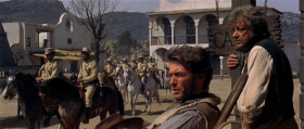 - What do you think they're carrying in the coach?
- It'd be easy to find out. Get up close to it and take a look inside. If they fire at you, you know it's gold.
- Not a bad idea.