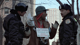 - Police. We've had some complaints about con men pretending to be blind and crippled.
- Oh, I'd love to help you, man, but I ain't seen nothing since I stepped on that landmine in Vietcong back in '72. It was rough, very painful.
- You were in Nam? So were we. Where?
- I was in Sang Bang, Dang Gong. I was all over that place, basically a lot of places, a lot of places.
- What unit were you in?
- I was with the Green Berets, Special Unit Battalion's Commando Airborne Tactics Specialist Tactics Unit Battalion. Yeah, it was real hush-hush. I was Agent Orange. That was my name, Agent Orange. Special Agent Orange, that was me.
- Airborne, huh?
- I can see! I can see! I have... I have legs. I have... Oh shit, look at this. Man! I can walk. Jesus, praise Jesus.