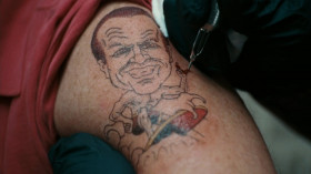 <b>Edward Cole:</b> - So you decided?
<b>Carter Chambers:</b> - No, I couldn't think of anything I wanted to be stuck with permanently.
<b>Edward Cole:</b> - What's permanently? We're gonna be dead in five minutes.
<b>Tattoo Artist:</b> - What?
<b>Edward Cole:</b> - Figure of speech. So no Confederate flag, no black Jesus.
<b>Carter Chambers:</b> - No, I'm gonna...
<b>Edward Cole:</b> - Pass. Yeah, sure.
<b>Carter Chambers:</b> - Well, I never agreed to desecrate my body.
<b>Edward Cole:</b> - You worried they won't bury you in a Jewish cemetery?