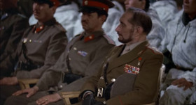 Attention! Be seated, comrades. What I despise most about warfare is the hypocrisy it often breeds. I've heard euphemisms that we are containing the enemy, that our sector of pacification is growing. These are the tactics of the lie. Lies have the stench of death and defeat. You can only win a war by exterminating the enemy. Do you know who we are fighting? We are fighting Wolverines. Small, ferocious animals. For them, you need a hunter. And you know... I am the hunter. From this moment on there will be no further reprisals against civilians. This is stupid. Impotence. Comrades... If a fox stole your chickens, would you slaughter your pig because he saw the fox? No. You would hunt the fox. Find where it lives and destroy it! And how do we do this? Become a fox.