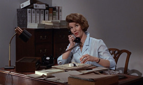 <b>Miss Moneypenny:</b> - Where in the world are you, James?
<b>James Bond:</b> - I've just been reviewing an old case.
<b>Sylvia Trench:</b> - So I'm an old case now, am I?
<b>James Bond:</b> - It's the office. Tell him I'm on my way, will you.
<b>Sylvia Trench:</b> - He is not on his way.
<b>James Bond:</b> - Sylvia, behave. We'll do this again some other time soon.
<b>Sylvia Trench:</b> - Do what? Last time you said that, you went off to Jamaica. I haven't seen you for six months.
<b>James Bond:</b> - I'll be there in an hour.
<b>Miss Moneypenny:</b> - I'll tell him. Your old case sounds interesting, James.
<b>James Bond:</b> - Make that an hour and a half.
