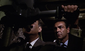 - I can see the face of the other man now.
- Krilencu! So, he's back. Another Bulgarian they use as a killer. Just the man for the limpet mine job. I've had trouble with him before. But he's stayed out of Istanbul for over a year now. Take a look. You should remember him. This man kills for pleasure.