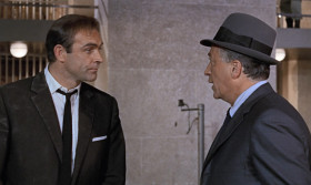 - Three more ticks and Mr. Goldfinger would have hit the jackpot. Did you get him?
- Not yet, but he won't get far.
- And Pussy?
- She helped us switch the gas in the canisters. By the way, what made her call Washington.
- I must have appealed to her maternal instincts.
- Come on, James. Get aboard. You can't keep the President waiting.
- Special plane, lunch at the White House. How come?
- The President wants to thank you personally.