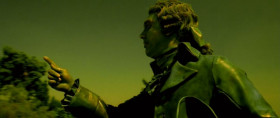 The fool looks at a finger that points at the sky.