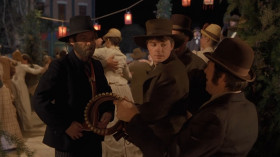 - You can have this brand-new Colt Peacemaker and gun belt, free of charge.
- Free?
- I want everybody to know the gun that shot Buford Tannen was a Colt Peacemaker!
- No problem. Thanks a lot.
- Of course, if you lose, I'm taking it back.