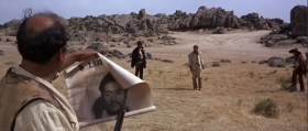 - No! No pistol, amigo! It won't do you any good. There are three of us! 
- Hey, amigo! You know you have a face beautiful enough to be worth $2000? 
- Yeah, but you don't look like the one who'd collect it.