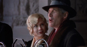 - Who's Fred Casely?
- My ex-boyfriend 
- Why'd you shoot him?
- I was leavin'...
- Still I said, "Fred, move along". She knew that she was doing wrong!
- Was he angry?
- Like a madman!
- Then describe it
- He came toward me
- With the pistol?
- From my bureau
- Did you fight him?
- Like a tiger!
- He had strength, and she had none! And yet we both reached for the gun!
- Oh, yes, oh, yes, oh, yes, we both! Oh, yes, we both, oh, yes, we both reached for The gun! The gun, the gun, the gun! Oh, yes, we both reached for the gun!
- Understandable! Understandable! Yes, it's perfectly understandable! Comprehensible! Comprehensible! Not a bit reprehensible, It's so defensible!