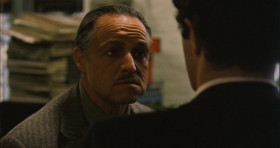 Santino, come here. What's the matter with you? I think your brain is going soft... from all that comedy you're playing with that young girl. Never tell anybody outside the family what you're thinking again.