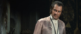 - Be so good as to leave the cabin so I may dress.
- You're not at Court now, Madame. This is a ship captained by a man whom the King condemned to death.
- Like a thief.
- Yes. And because of a woman like you. She made me steal from the treasury. She took the spoils before denouncing the thief. And I loved her.
- Why are you telling me?
- You're a woman.
- You're drunk.
- No, I'm mad! I'll make you pay for all those who suffered for your beauty, who wished for a glance from you, who prayed God that you would drop your kerchief, that they might pick it up from the dust in your wake.