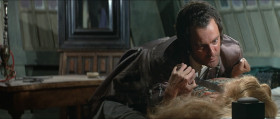 - Be so good as to leave the cabin so I may dress.
- You're not at Court now, Madame. This is a ship captained by a man whom the King condemned to death.
- Like a thief.
- Yes. And because of a woman like you. She made me steal from the treasury. She took the spoils before denouncing the thief. And I loved her.
- Why are you telling me?
- You're a woman.
- You're drunk.
- No, I'm mad! I'll make you pay for all those who suffered for your beauty, who wished for a glance from you, who prayed God that you would drop your kerchief, that they might pick it up from the dust in your wake.