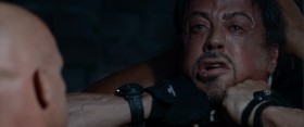 - Now this is your last time. You give me the right answer, and I'll cut you a break. If you give me the wrong answer, you will die a damn slow death. Do you understand me? Do you understand me? Who sent you?
- Can't breathe.
- Loosen up. Who sent you?
- Your hairdresser.