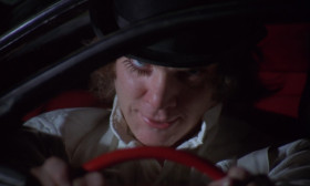 We fillied around for a while with other travelers of the night, playing Hogs of the Road. Then we headed west. What we were after now was the old surprise visit. That was a real kick, and good for laughs and lashings of the old ultra-violent.