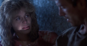 - Would you just talk about something? I don't know. Anything. Just talk. Tell me about my son.
- He's about my height. He has your eyes. What's he like? You trust him. He's got a strength. I'd die for John Connor.
- Well, at least now I know what to name him. Don't suppose you know who the father is so I won't tell him to get lost?
- John never said much about him. I know he dies before the war...
- Wait. I don't wanna know. So was it John that sent you here?
- I volunteered. It was a chance to meet the legend. Sarah Connor, who taught her son to fight, organize, prepare from when he was a kid. When you were in hiding before the war.
- You're talking about things I haven't done yet in the past tense. It's driving me crazy. Are you sure you have the right person? Come on. Do I look like the mother of the future? I mean, am I tough? Organized? I can't even balance my checkbook. Look, Reese, I didn't ask for this honor and I don't want it. Any of it.
- Your son gave me a message to give to you. Made me memorize it. «Thank you, Sarah, for your courage through the dark years. I can't help you with what you must soon face, except to say the future is not set. You must be stronger than you imagine you can be. You must survive or I will never exist». That's all. 