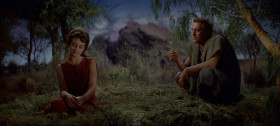 - What are you thinking about?
- I'm free. And what do I know? I don't even know how to read.
- You know things that can't be taught.
- I know nothing. Nothing. And I wanna know. I want to... I wanna know.
- Know what?
- Everything! Why a star falls and a bird doesn't, where the sun goes at night, why the moon changes shape. I wanna know where the wind comes from.
- The wind begins in a cave: far to the north, a young god sleeps in that cave. He dreams of a girl and he sighs, and the night wind stirs with his breath.
- I wanna know all about you. Every line, every curve. I wanna know every part of you. Every beat of your heart.