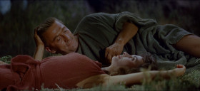 - What are you thinking about?
- I'm free. And what do I know? I don't even know how to read.
- You know things that can't be taught.
- I know nothing. Nothing. And I wanna know. I want to... I wanna know.
- Know what?
- Everything! Why a star falls and a bird doesn't, where the sun goes at night, why the moon changes shape. I wanna know where the wind comes from.
- The wind begins in a cave: far to the north, a young god sleeps in that cave. He dreams of a girl and he sighs, and the night wind stirs with his breath.
- I wanna know all about you. Every line, every curve. I wanna know every part of you. Every beat of your heart.