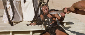 - Magnificent. You have nothing more to learn, Red Sonja. You are the master of the master. Never have I seen your equal. Sonja, you must learn to like
men a little better. They are not all evil.
- We must judge by our own experience, grand master.
- I know. But in life, all is not swordplay. Hatred of men in a lovely young woman - it could be your downfall.
- I don't hate all men, grand master.
- That would have been music to my ears 30 years ago.