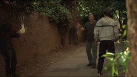 - All right, mate. You got any money?
- Yeah.
- What?
- Yes, I've got money.
- Give it to me then.
- Why?
- 'Cause I'll fuckin' kill you if you don't.
- Does that usually work, does it? To most people, the threat of death is worse than giving you money, but... Or they're worried you'll hurt their family or... I haven't got any family. I'm not gonna go into it, but I don't care about anything anymore. I'm not giving you any money.
- Are you mental?
- No, I'm just tired of doing things I don't wanna do, and we always have a choice. And if I've read this right, my choice is either violence or hand over my money peacefully to two useless little cunts.
- Are you mad?
- No. Fuck off! Okay? Just fuck off.