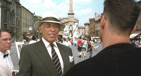 - Enjoying Italy?
- Yeah.
- Yes. I've always had a soft spot in my heart for Roma. I did my first bare-handed strangulation here. Communist politician.
- Why, George, you big softy.
- God, I miss Communism. The Red threat. People were scared... the agency had some respect, and I got laid every night.