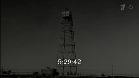 Nearby in the darkness, something hangs atop a steel tower... a bomb. Today they will test it. The test is code-named Trinity. The inspiration... John Donne, Robert Oppenheimer's favorite poet. One of the premier scientists of his age, Oppenheimer loved literature and the desert of the Southwest. He was a peaceful man, who just happened to have created and coordinated the most destructive weapon in all history. <...> At 5:29 and 45 seconds, the bomb detonates. The light is brighter than the sun. Observing the explosion, Oppenheimer recalls a line from the hindu scripture, "Now I am become death, the destroyer of worlds." This terrifying weapon would launch the United States on a journey, turning the refuge of the founding fathers into a militarized state.