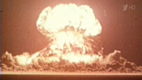 Nearby in the darkness, something hangs atop a steel tower... a bomb. Today they will test it. The test is code-named Trinity. The inspiration... John Donne, Robert Oppenheimer's favorite poet. One of the premier scientists of his age, Oppenheimer loved literature and the desert of the Southwest. He was a peaceful man, who just happened to have created and coordinated the most destructive weapon in all history. <...> At 5:29 and 45 seconds, the bomb detonates. The light is brighter than the sun. Observing the explosion, Oppenheimer recalls a line from the hindu scripture, "Now I am become death, the destroyer of worlds." This terrifying weapon would launch the United States on a journey, turning the refuge of the founding fathers into a militarized state.