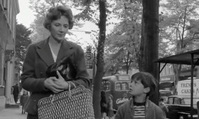- Rachel's not allowed to eat ham.
- Well, that's because she's Jewish.
- Why don't Jewish people eat ham?
- Oh, Mike, do stop asking questions.
- But why don't they?
- Well, it's their religion. It's different from ours.
- Why?
- Mike, for goodness sake!
- Look, Mum, that's where Rachel goes to church.
- That's the synagogue.
- Can I go with her one day? She goes to service on Saturdays instead of Sundays.
- Michael, you must never do that.
- Why not?
- Well, because you're a Catholic. It would be a sin.
- A bad one?
- Yes, a very bad one.
- Gosh!