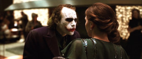 You look nervous. Is it the scars? You wanna know how I got them? Come here. Hey. Look at me. So I had a wife. She was beautiful, like you... who tells me I worry too much... who tells me I ought to smile more... who gambles and gets in deep with the sharks. Hey. One day they carve her face. And we have no money for surgeries. She can't take it. I just wanna see her smile again. I just want her to know that I don't care about the scars. So... I stick a razor in my mouth and do this... to myself. And you know what? She can't stand the sight of me. She leaves. Now I see the funny side. Now I'm always smiling.